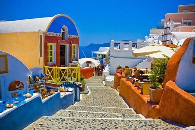 Exploring Oia village and its iconic blue-domed roofs